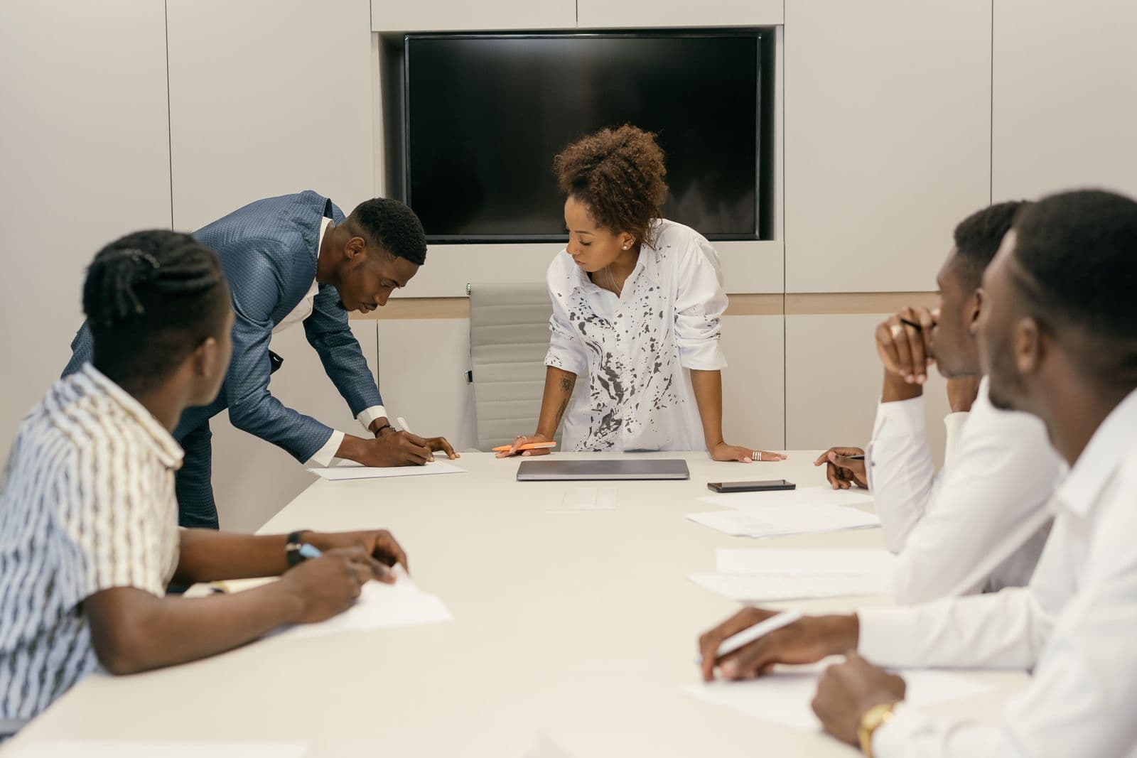Legal professionals in a boardroom meeting